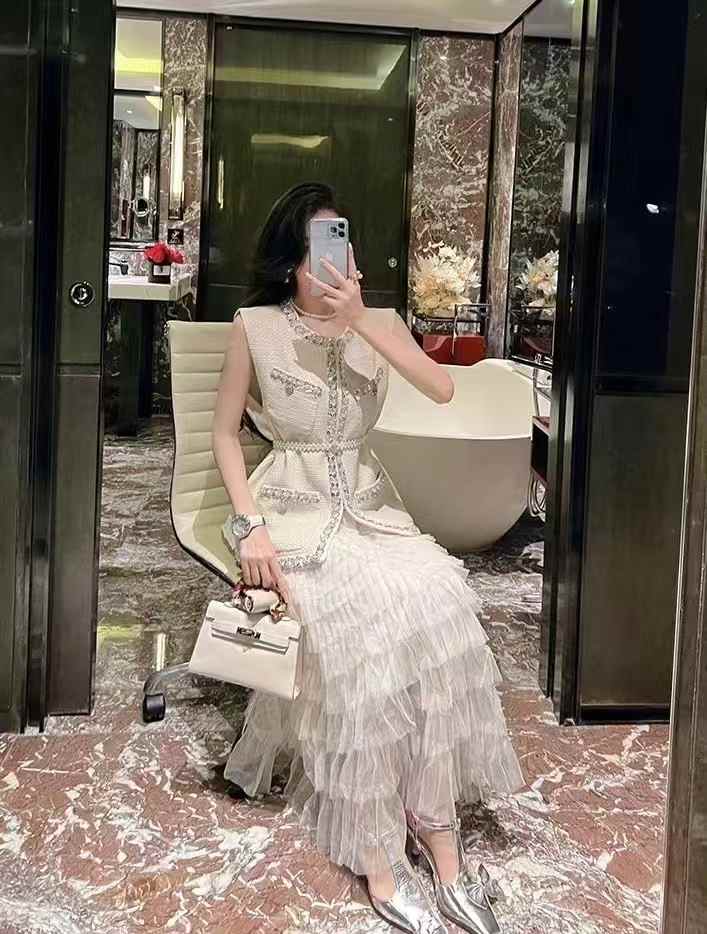 Beaded sleeveless vest